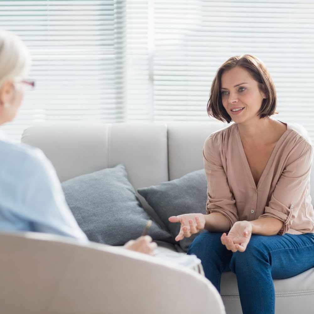 Woman talking to therapist